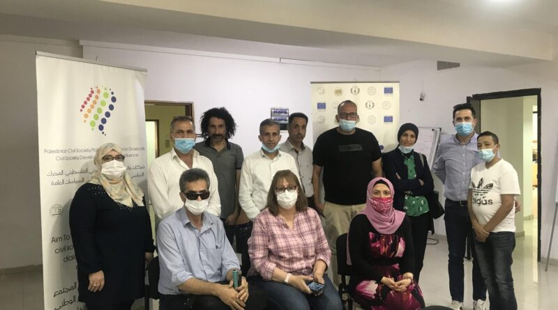 جانب من اجتماع مناقشة تطوير العلاقة مع المؤسسات، والجمعيات القاعدية